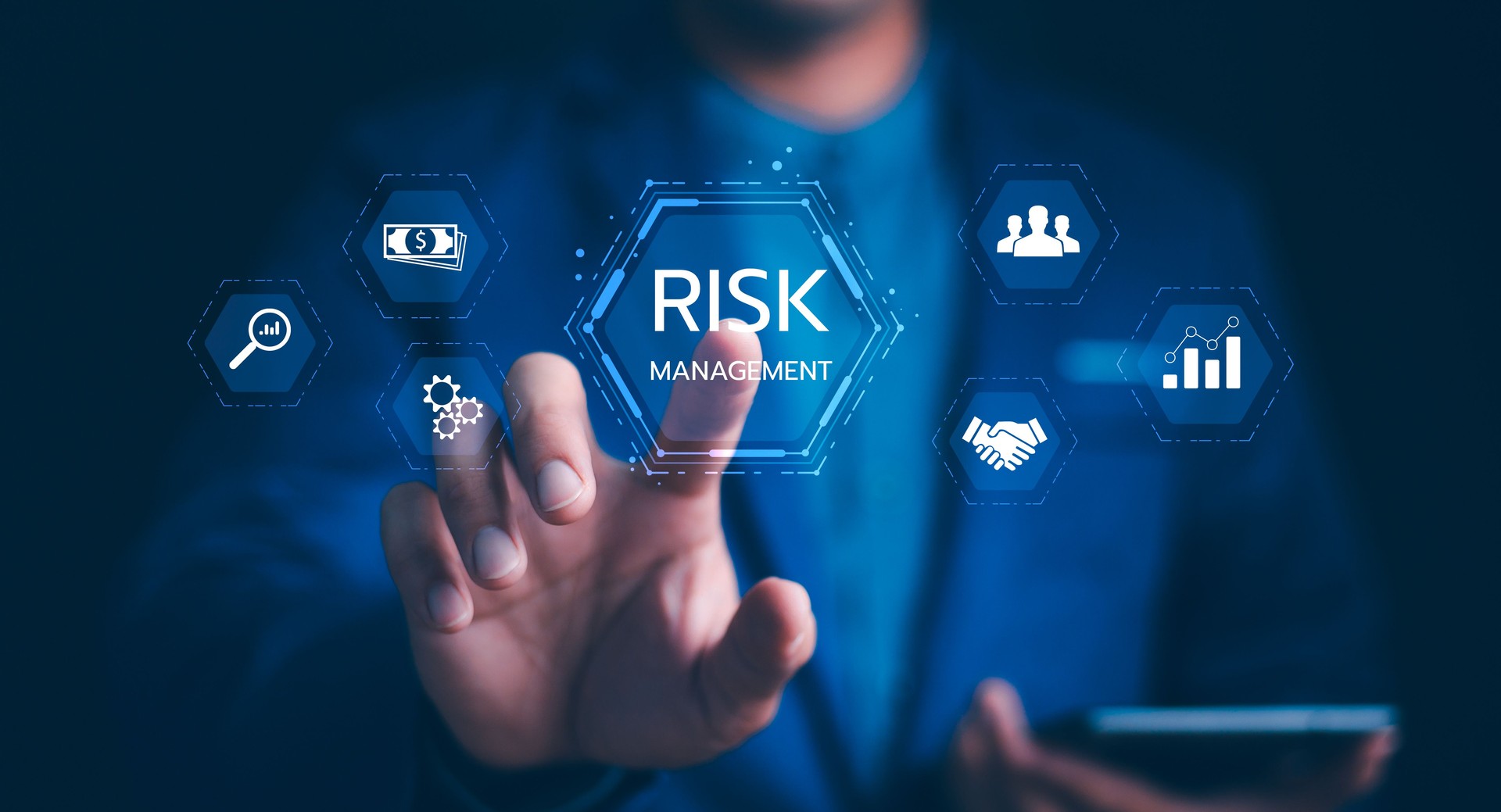 Risk Management: Navigating future business challenges with strategic solutions. Businessman with a digital risk assessment, financial protection, data analysis, for business continuity and security.